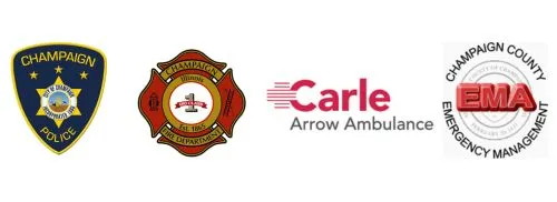 Logos of the Champaign Police, Fire Department, Carle Arrow Ambulance, and Champaign County Emergency Management