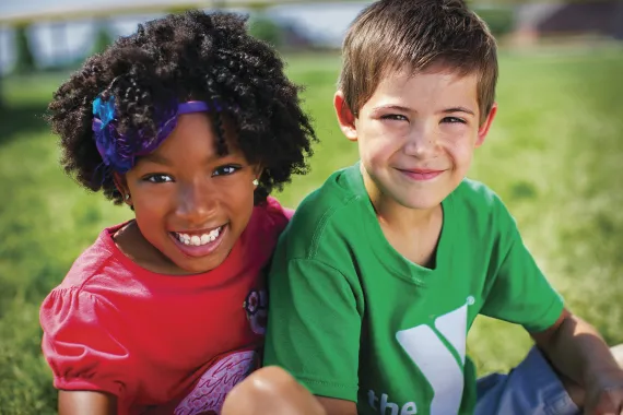 two kids smiling