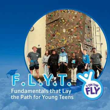flyt participants in front of a rock wall