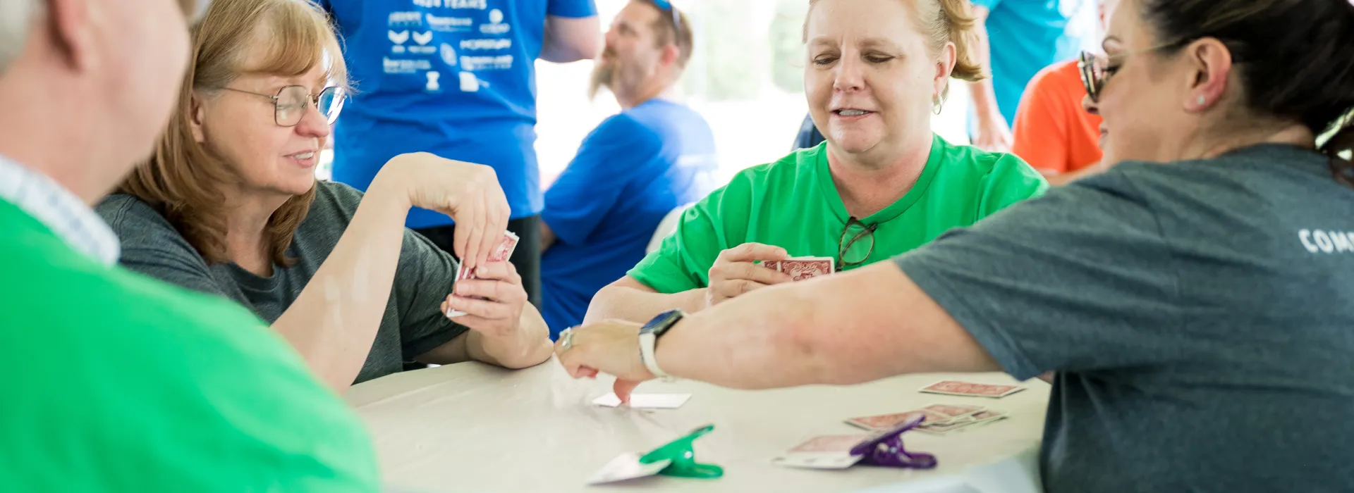 Adults playing euchre