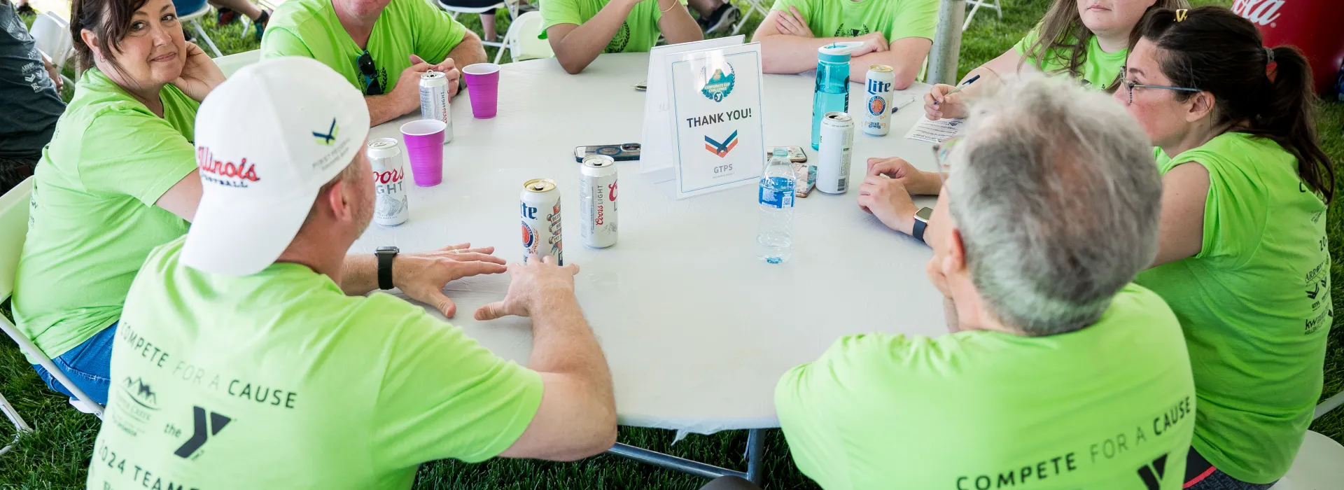 team seated around a round table
